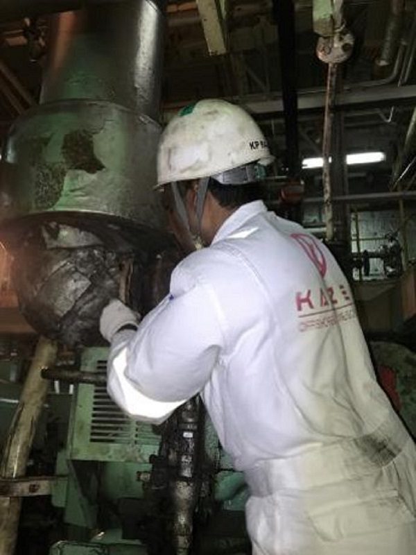 Workers working on Machinery image
