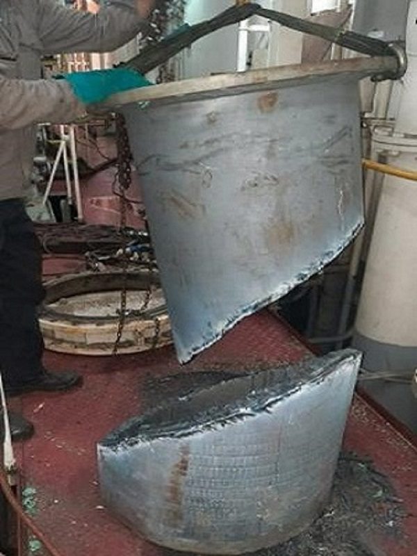 Workers working on Metal Pipe