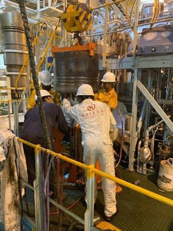 Workers Working on Machinery image