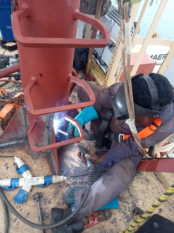 Worker on Container ship